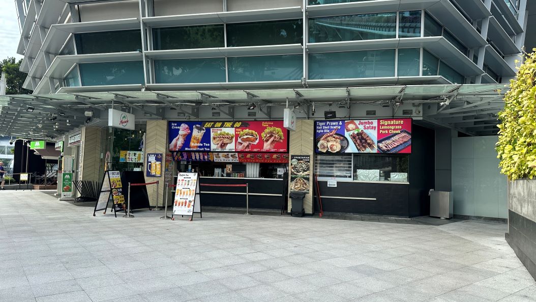 Singapur Fastfood-Stand bargeldlos bezahlen